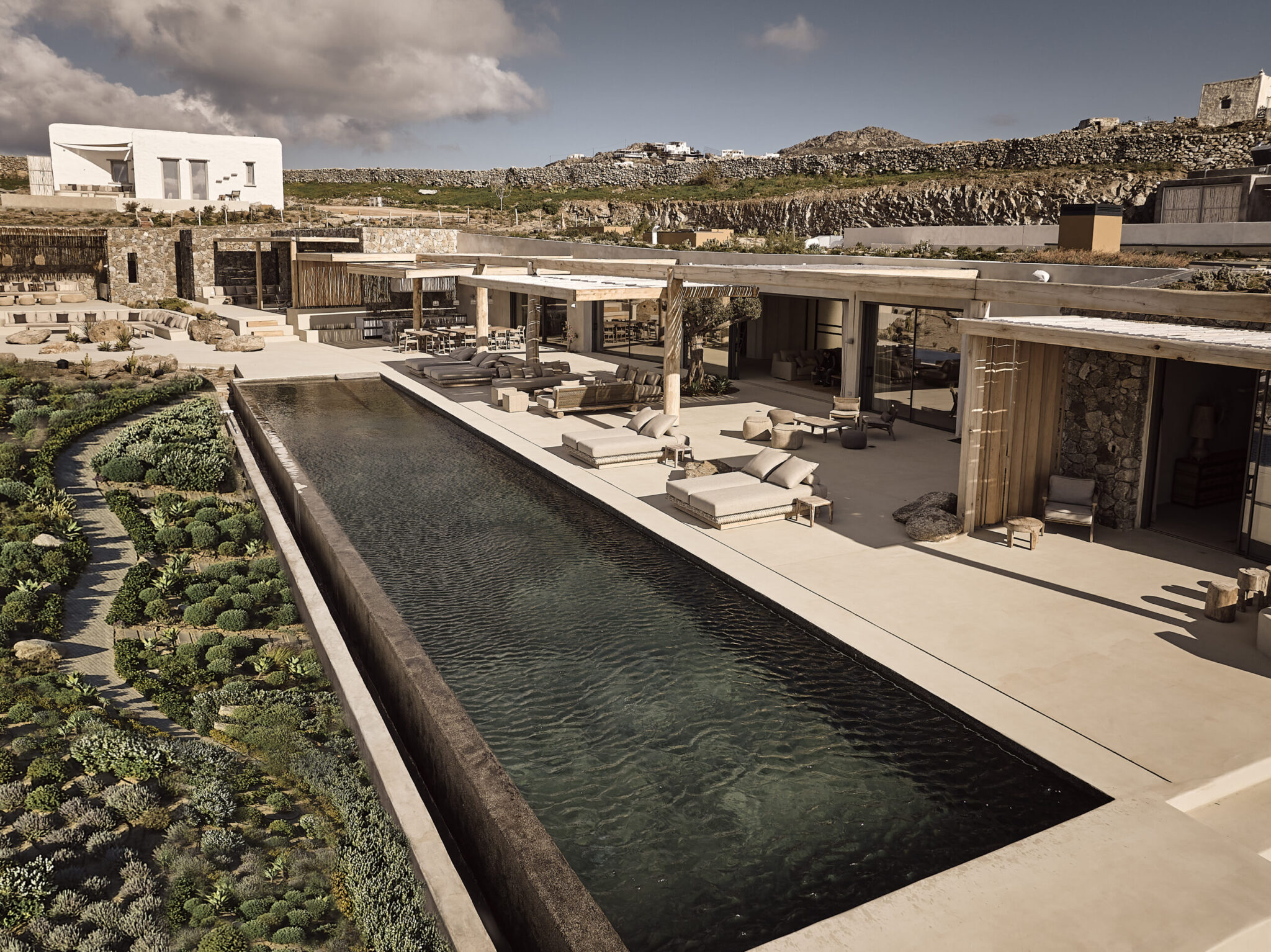 Aerial view of Villa Meridian with private pool and landscaped gardens in Mykonos